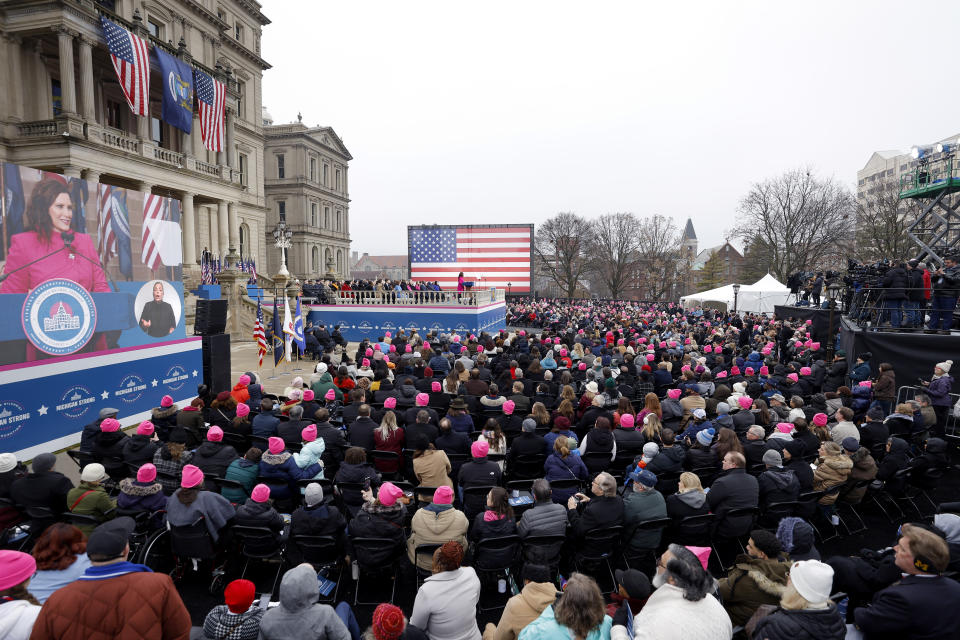 Michigan Gov. Gretchen Whitmer addresses the crowd during inauguration ceremonies, Sunday, Jan. 1, 2023, outside the state Capitol in Lansing, Mich. (AP Photo/Al Goldis)