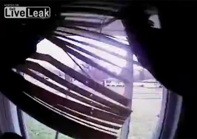 The burglar thought he could escape by jumping from the bathroom window. Source: LiveLeak/JThom