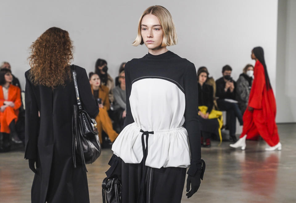 Fashion from Proenza Schouler collection is modeled during Fashion Week, Friday, Feb. 11, 2022 in New York. (AP Photo/Bebeto Matthews)