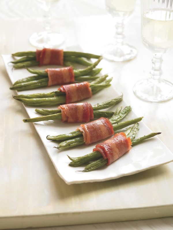 <p>Courtesy of Devin Alexander</p><p>This fun, easy appetizer is a perfect example of what you might consider making the next time a bacon craving strikes.</p><p><strong>Get the Recipe: <a href="/156787/devinalexander/bacon-wrapped-green-bean-bundles/" data-ylk="slk:Bacon-Wrapped Green bean Bundles;elm:context_link;itc:0;sec:content-canvas" class="link rapid-noclick-resp">Bacon-Wrapped Green bean Bundles</a></strong></p>