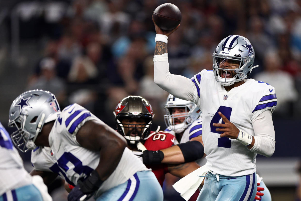 Dak Prescott of the Dallas Cowboys left Sunday's game early with a right hand injury. (Photo by Tom Pennington/Getty Images)