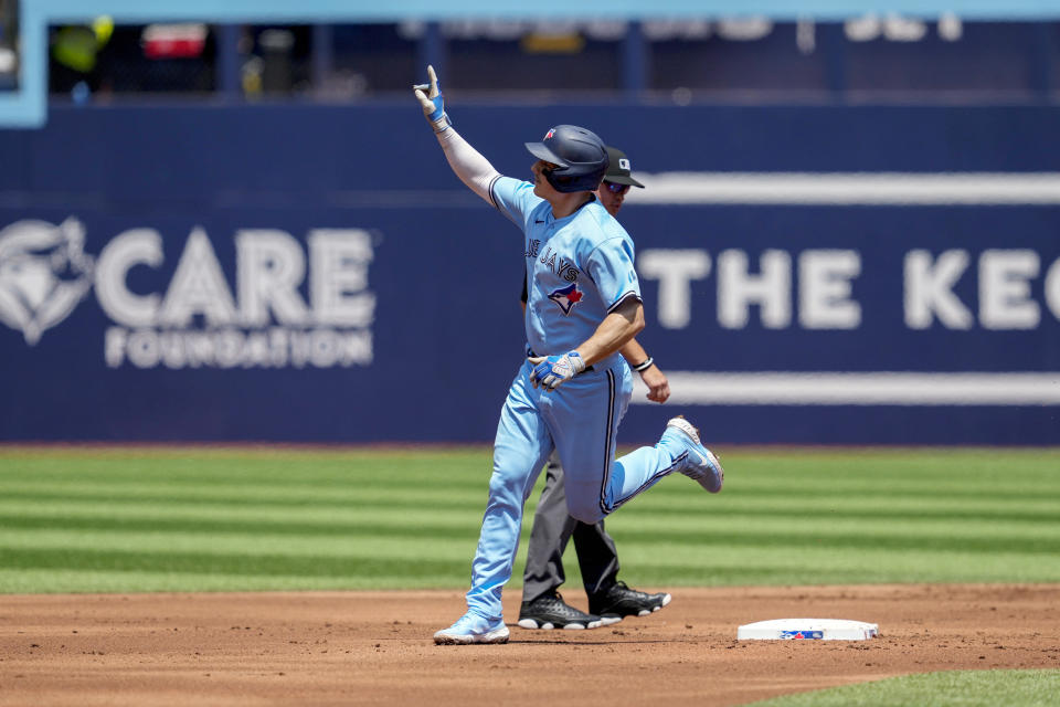 Toronto Blue Jays' Matt Chapman (26) celebrates his two-run home run during the first inning of a baseball game against the Milwaukee Brewers in Toronto, Thursday, June 1, 2023. (Andrew Lahodynskyj/The Canadian Press via AP)