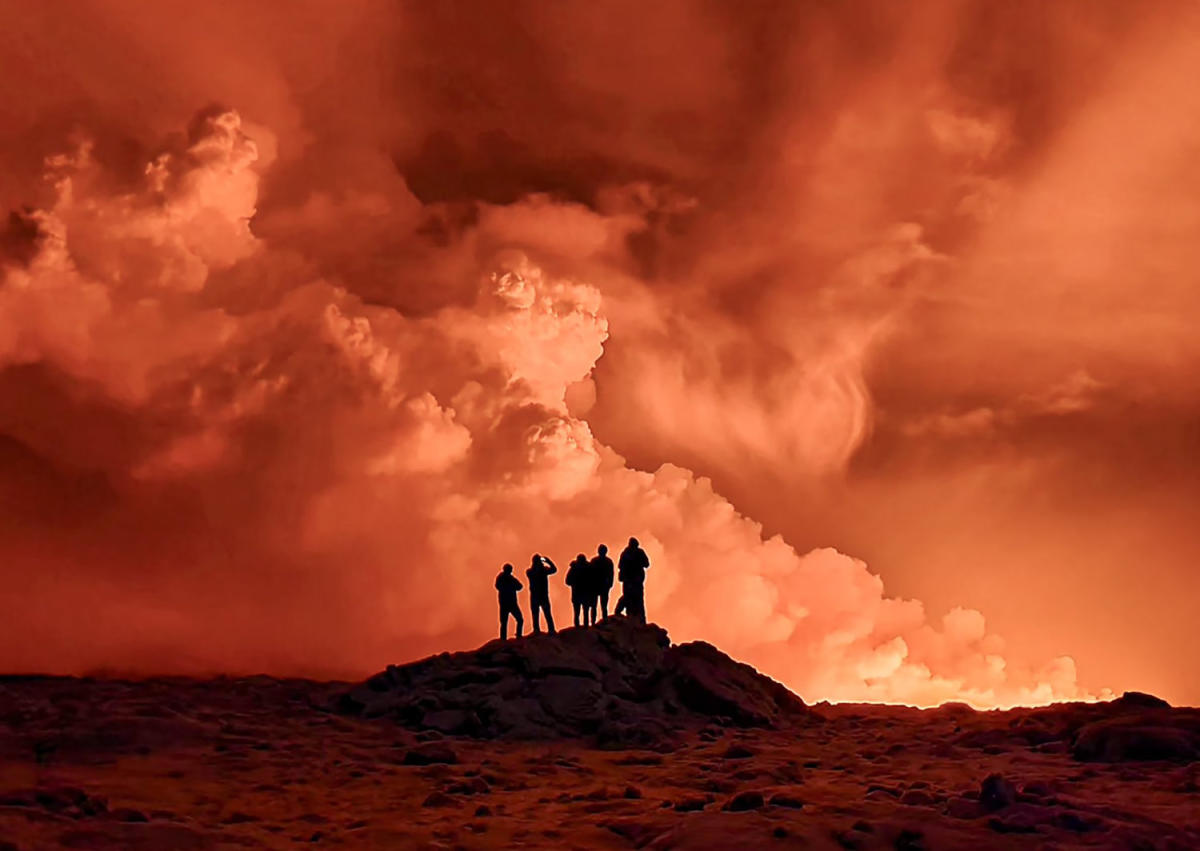 Iceland volcano continues to spew lava, but officials say an evacuated town may be spared