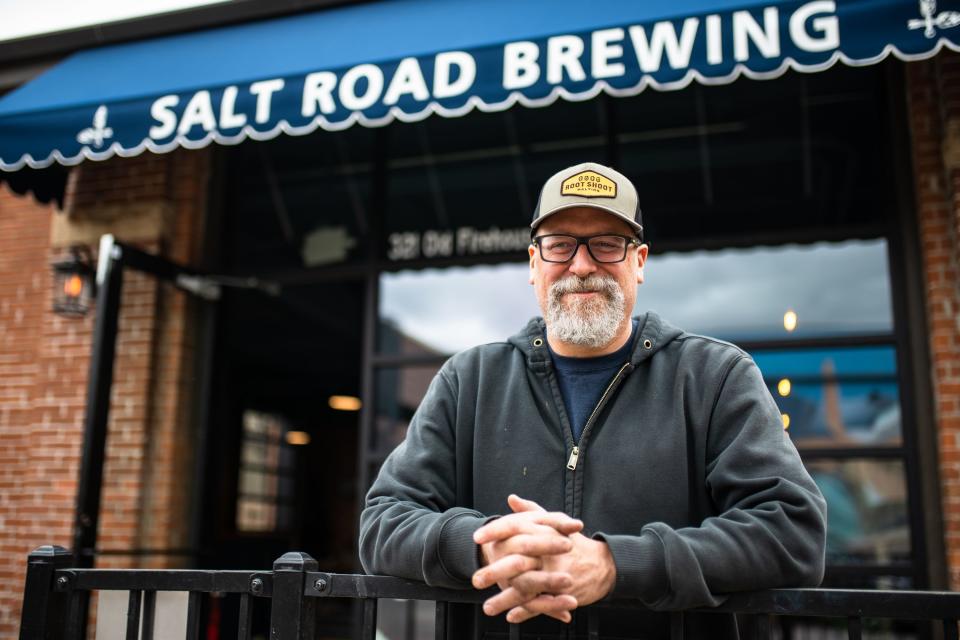 Salt Road Brewing owner-operator Scott Ficarra stands for a portrait at the new downtown brewery Wednesday in Fort Collins.