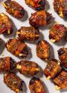 <p>If you want to take your girls' night up a notch, make these sweet and savory bacon-wrapped dates. The sweet dates are complemented perfectly by the salty bacon, while the goat cheese lends a creamy factor to the entire flavor-packed bite. </p><p>Get the <strong><a href="https://www.delish.com/cooking/recipe-ideas/a30500756/easy-bacon-wrapped-dates-recipe/" rel="nofollow noopener" target="_blank" data-ylk="slk:Bacon-Wrapped Dates recipe;elm:context_link;itc:0;sec:content-canvas" class="link ">Bacon-Wrapped Dates recipe</a></strong>. </p>