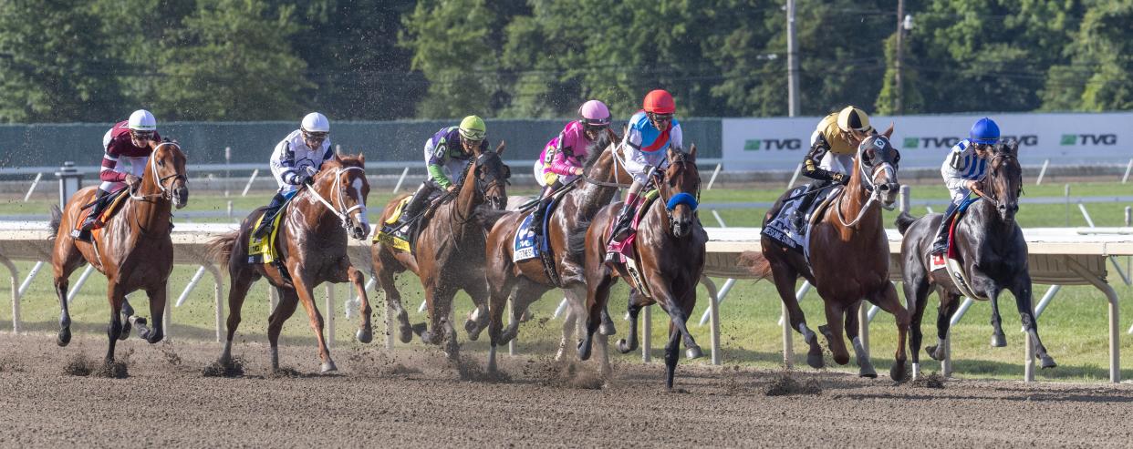 Geaux Rocket Ride (inside), ridden by MIke Smith, pulls away to win the TVG.com Haskell Stakes at Monmouth Park on July 22, 2023.