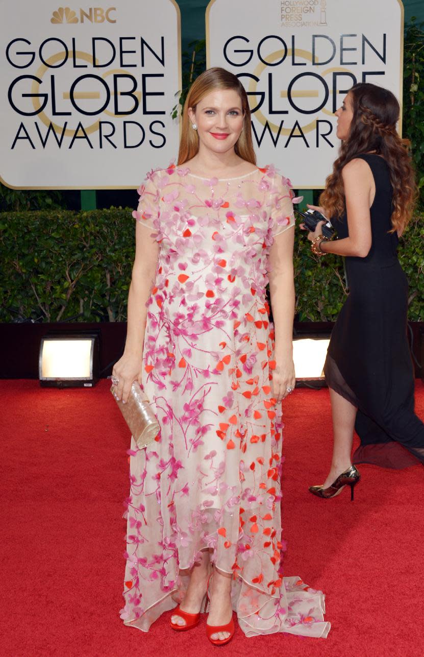 Drew Barrymore arrives at the 71st annual Golden Globe Awards at the Beverly Hilton Hotel on Sunday, Jan. 12, 2014, in Beverly Hills, Calif. (Photo by John Shearer/Invision/AP)