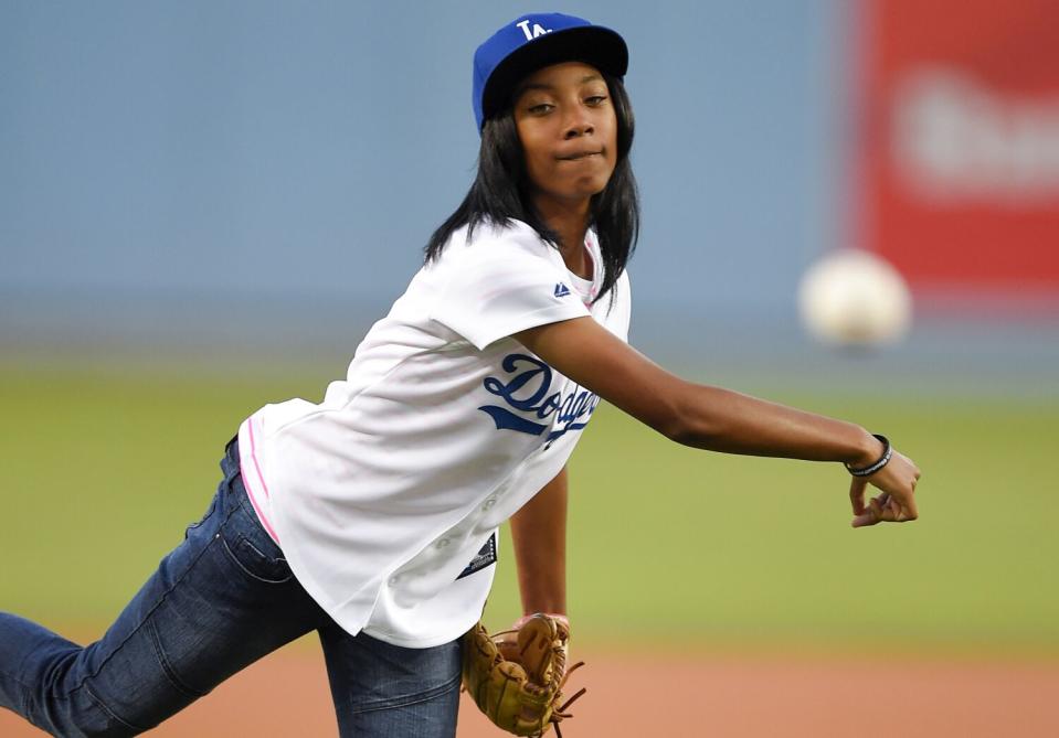 Mo'ne Davis throws out the ceremonial first pitch prior to a baseball game