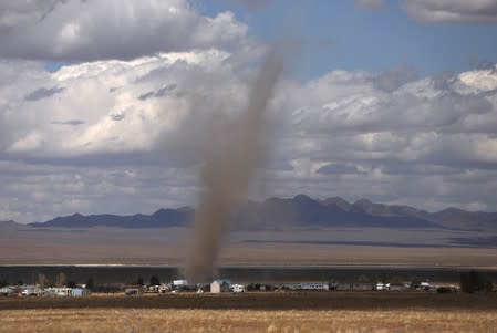 Dust blows through the desert as an influx of tourists responding to a call to 'storm' Area 51, a secretive U.S. military base believed by UFO enthusiasts to hold government secrets about extra-terrestrials, is expected in Rachel, Nevada