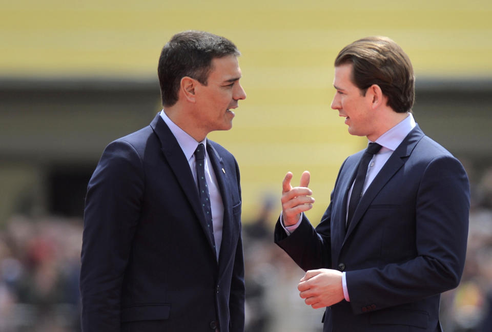 Spanish Prime Minister Pedro Sanchez, left, speaks with Austrian Chancellor Sebastian Kurz as they arrive for an EU summit in Sibiu, Romania, Thursday, May 9, 2019. European Union leaders on Thursday start to set out a course for increased political cooperation in the wake of the impending departure of the United Kingdom from the bloc. (AP Photo/Andreea Alexandru)