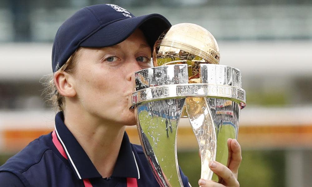 Heather Knight poses with the World Cup trophy after England beat India at Lord’s in one of the most dramatic matches ever seen at the ground.