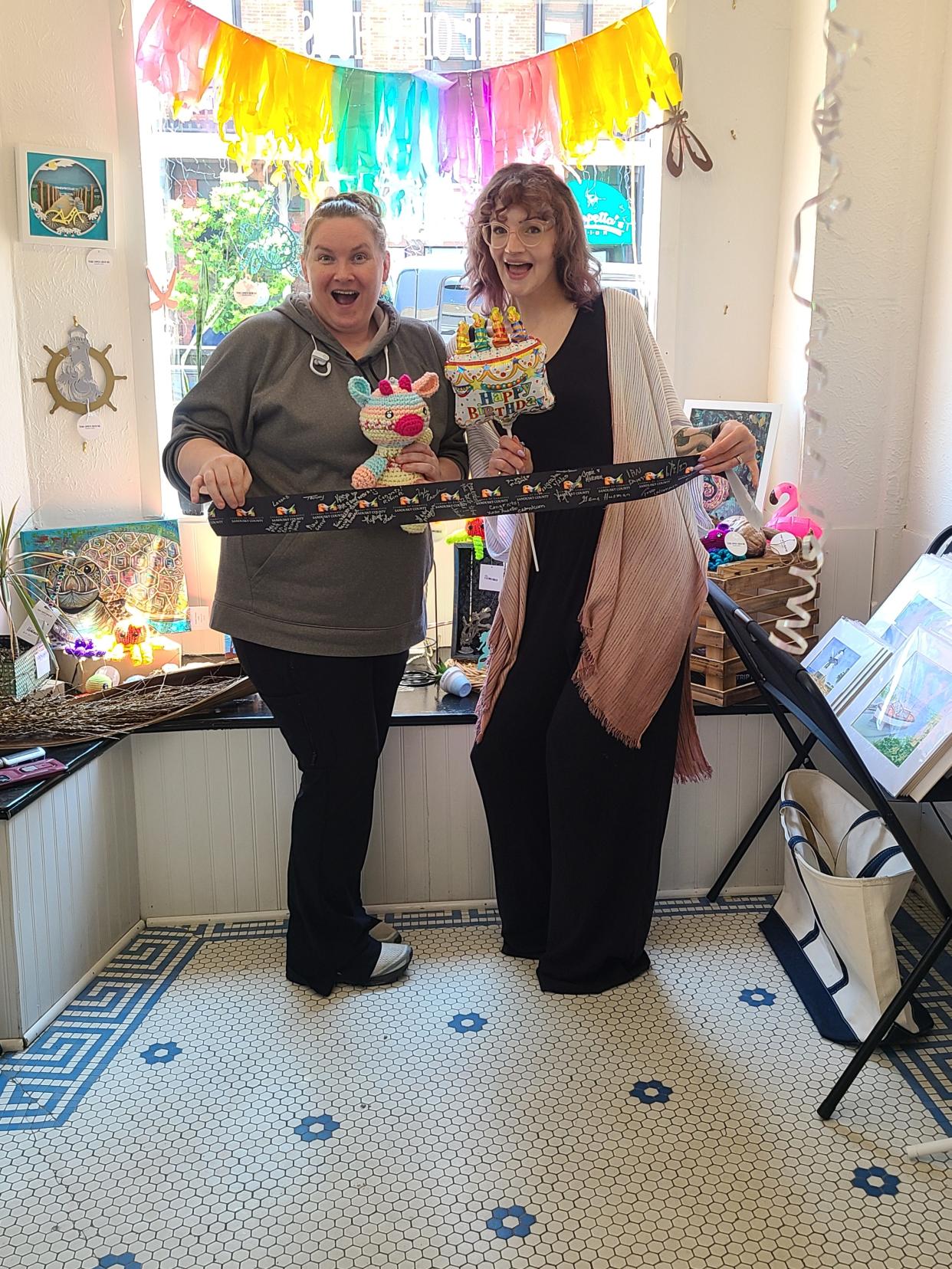 Open House co-owners Tammy Seikel, left, and Emma Lehmann celebrate three years of operation in downtown Fremont.