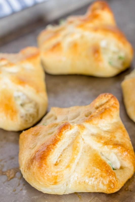 <p>Devour Dinner</p><p>Cream cheese and shredded chicken fill these flaky croissants and they are packed full of flavor and so delicious.</p><p><strong>Get the recipe: <a href="https://www.devourdinner.com/chicken-cream-cheese-croissants/" rel="nofollow noopener" target="_blank" data-ylk="slk:Cream Cheese and Chicken Stuffed Croissants;elm:context_link;itc:0;sec:content-canvas" class="link rapid-noclick-resp"><em>Cream Cheese and Chicken Stuffed Croissants</em></a></strong></p>