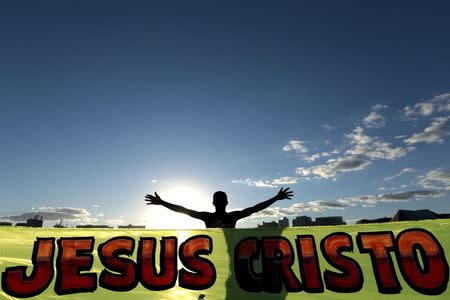 An evangelical Christian is pictured as they march during the "Jesus Parade" in downtown Brasilia August 14, 2014. REUTERS/Joedson Alves