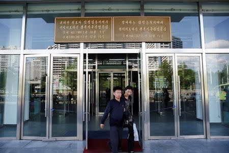 People leave a department store in central Pyongyang, North Korea May 4, 2016. REUTERS/Damir Sagolj