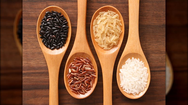 wooden spoons with dried rice