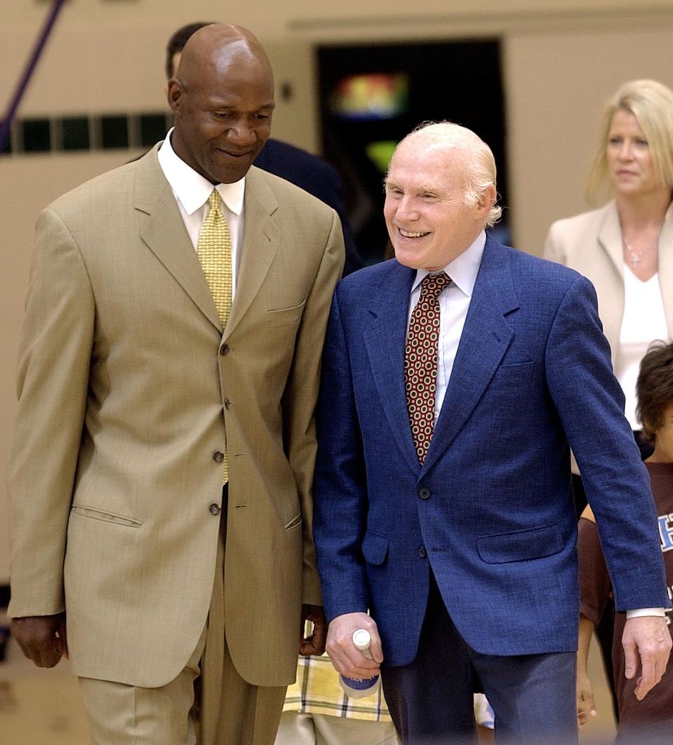 Milwaukee native Terry Porter and U.S. Sen. Herb Kohl, owner of the Milwaukee Bucks, chat before the news conference where Porter was introduced as the team's new coach on Aug. 6, 2003, at the team's training facility in St. Francis, Wis.