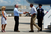 <p>Louisiana Governor John Bel Edwards (2nd L) and his wife Donna (L) greet U.S. President Barack Obama as he arrives aboard Air Force One at Baton Rouge Metropolitan Airport in Baton Rouge, La., Aug. 23, 2016. (Photo: Jonathan Ernst/Reuters) </p>