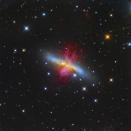 <p>This cartoon-esque image shows a brightly coloured galaxy some 5,000 light years away from Earth as a superwind rips through it. (Ivan Eder)</p>