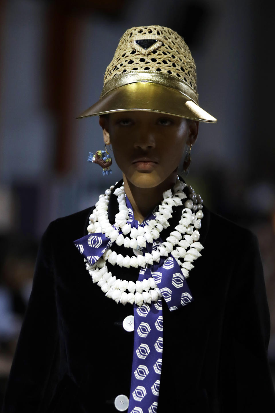 A model wears a creation as part of the Prada Spring-Summer 2020 collection, unveiled during the fashion week, in Milan, Italy, Wednesday, Sept. 18, 2019. (AP Photo/Luca Bruno)