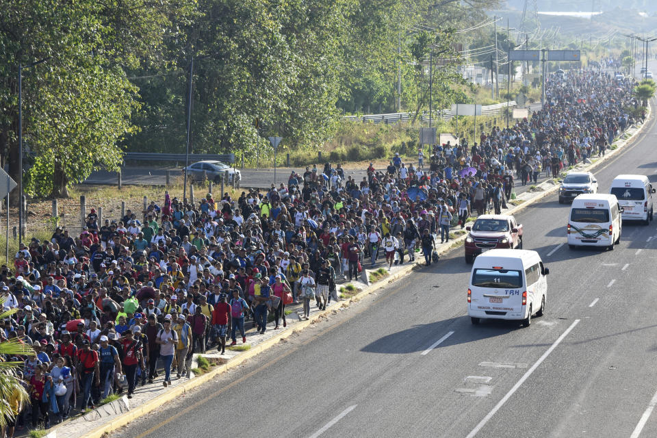 Migrants depart from Tapachula, Mexico, Sunday, Dec. 24, 2023. The caravan started the trek north through Mexico just days before U.S. Secretary of State Antony Blinken arrives in Mexico City to discuss new agreements to control the surge of migrants seeking entry into the United States. (AP Photo/Edgar Hernandez Clemente)