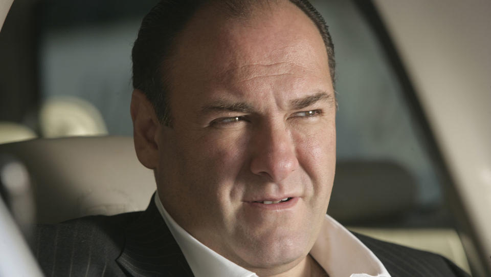 Tony Soprano (<span class="caas-xray-inline-tooltip"><span class="caas-xray-inline caas-xray-entity caas-xray-pill rapid-nonanchor-lt" data-entity-id="James_Gandolfini" data-ylk="cid:James_Gandolfini;pos:6;elmt:wiki;sec:pill-inline-entity;elm:pill-inline-text;itc:1;cat:Actor;" tabindex="0" aria-haspopup="dialog"><a href="https://search.yahoo.com/search?p=James%20Gandolfini" data-i13n="cid:James_Gandolfini;pos:6;elmt:wiki;sec:pill-inline-entity;elm:pill-inline-text;itc:1;cat:Actor;" tabindex="-1" data-ylk="slk:James Gandolfini;cid:James_Gandolfini;pos:6;elmt:wiki;sec:pill-inline-entity;elm:pill-inline-text;itc:1;cat:Actor;" class="link ">James Gandolfini</a></span></span>) in <em>The Sopranos.</em>