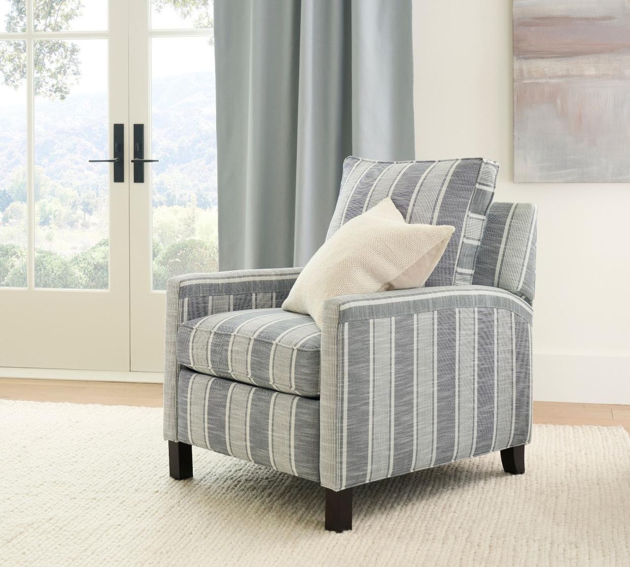 <p><a href="https://go.redirectingat.com?id=74968X1596630&url=https%3A%2F%2Fwww.potterybarn.com%2Fproducts%2Ftyler-upholstered-recliner%2F&sref=https%3A%2F%2Fwww.elle.com%2Ffashion%2Fshopping%2Fg60202350%2Fbest-recliners%2F" rel="nofollow noopener" target="_blank" data-ylk="slk:Shop Now;elm:context_link;itc:0;sec:content-canvas" class="link rapid-noclick-resp">Shop Now</a></p><p>Tyler Square Arm Upholstered Recliner</p><p>$1299.00</p>