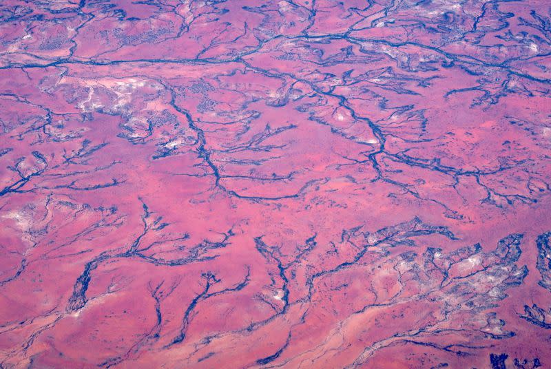 FILE PHOTO: Dried-up rivers and creeks can be seen in the Queensland outback near the town of Mount Isa, Australia