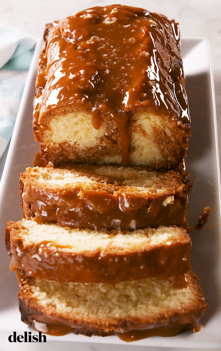 <p>This is no ordinary <a href="https://www.delish.com/cooking/recipe-ideas/a20086982/easy-pound-cake-recipe/" rel="nofollow noopener" target="_blank" data-ylk="slk:pound cake;elm:context_link;itc:0" class="link ">pound cake</a>. It's swirled with a sweet and decadent caramel batter <em>and</em> topped with a healthy drizzle of salted caramel after it's baked. We recommend using our perfect <a href="https://www.delish.com/cooking/recipe-ideas/a20086982/easy-pound-cake-recipe/" rel="nofollow noopener" target="_blank" data-ylk="slk:caramel sauce;elm:context_link;itc:0" class="link ">caramel sauce</a> for this recipe (but store-bought works too!).</p><p>Get the <strong><a href="https://www.delish.com/cooking/recipe-ideas/a28540769/salted-caramel-pound-cake-recipe/" rel="nofollow noopener" target="_blank" data-ylk="slk:Salted Caramel Pound Cake recipe;elm:context_link;itc:0" class="link ">Salted Caramel Pound Cake recipe</a></strong>.<br></p>