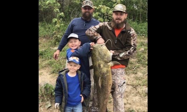 Boy saves allowance for new rod, lands 83-pound catfish