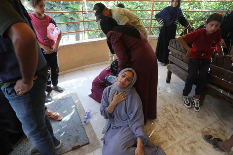 Palestinian women mourn and grief after a number of Palestinians were killed during the Israeli army's attack on Gaza. Abed Rahim Khatib/dpa