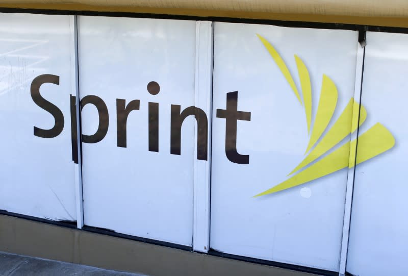 FILE PHOTO: The logo of U.S. mobile network operator Sprint Corp is seen at a Sprint store in San Marcos, California August 3, 2015. REUTERS/Mike Blake/File Photo