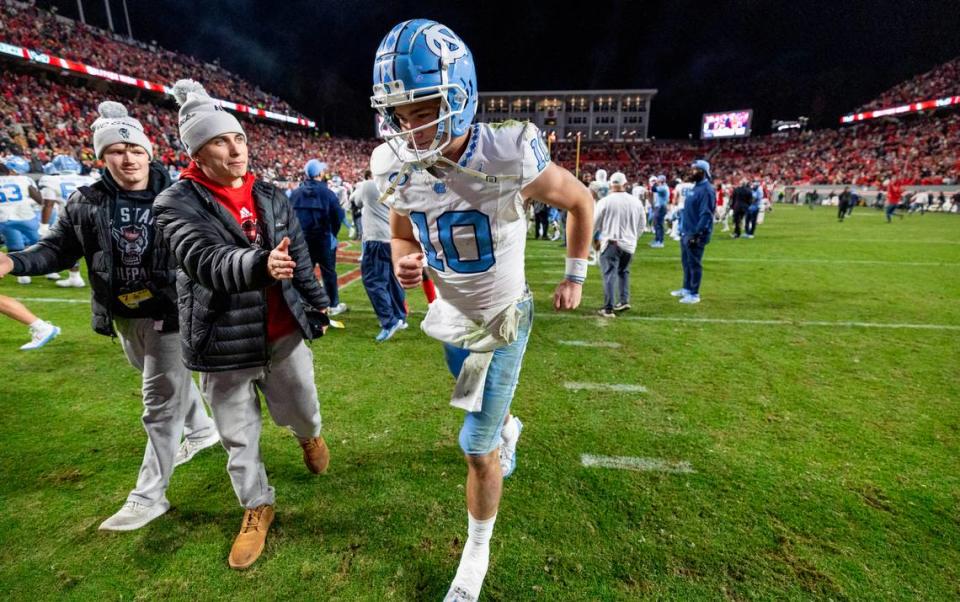 North Carolina quarterback Drake Maye (10) leaves the field following the Wolfpack’s 39-20 victory on Saturday, November 25, 2023 at Carter-Finley Stadium in Raleigh, N.C.
