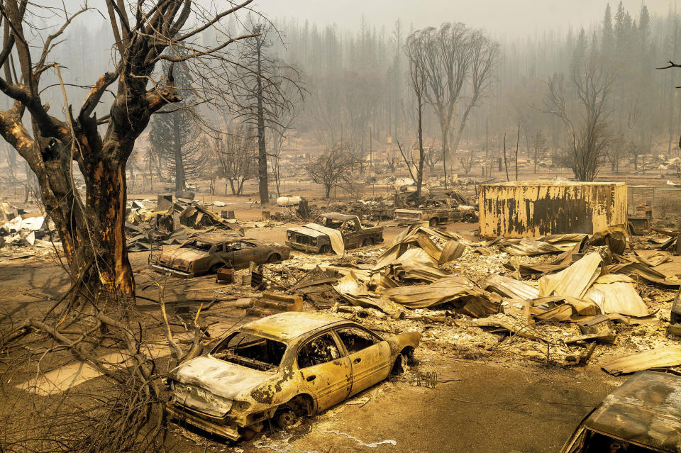 Cars and homes were destroyed by the Dixie Fire on August 5, 2021, in Plumas County, California. / Credit: Noah Berger / AP