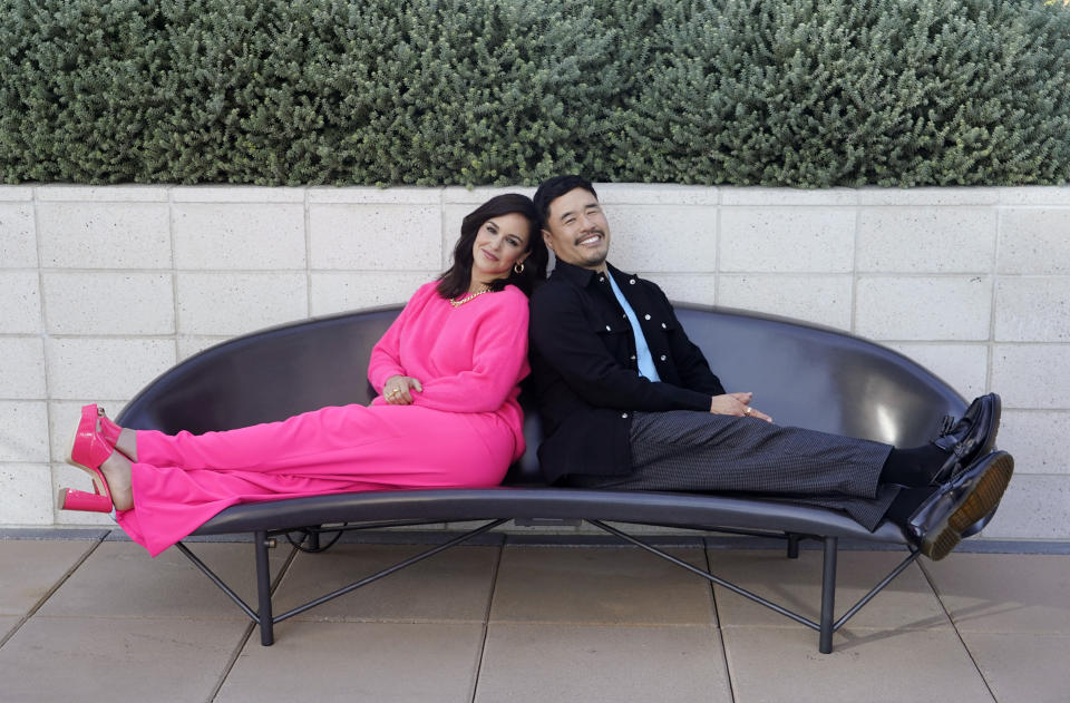 Melissa Fumero, left, and Randall Park, cast members in the Netflix series "Blockbuster," pose together for a portrait, Monday, Oct. 24, 2022, in Los Angeles. (AP Photo/Chris Pizzello)