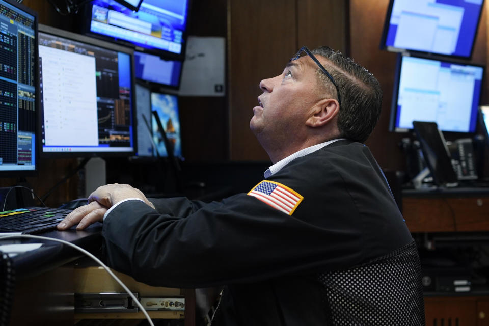 A Trader works on the floor at the New York Stock Exchange in New York, Thursday, Dec. 29, 2022. Stocks are opening higher on Wall Street Thursday in a broad rally led by the IT and communications sectors. (AP Photo/Seth Wenig)