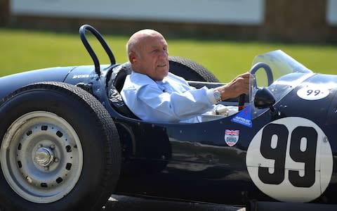 Goodwood Festival of Speed...Sir Stirling Moss driving an historic Grand Prix car after taking part in the hill climb event at the Goodwood Festival of Speed in Chichester, West Sussex. PRESS ASSOCIATION Photo. Picture date: Sunday July 3, 2011. Photo credit should read: Clive Gee/PA Wire - Credit: Clive Gee/PA