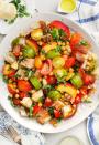 <p>Fresh peaches give this panzanella an extra-summery spin.</p> <p>Get the recipe <a href="https://www.loveandlemons.com/panzanella-salad/" rel="nofollow noopener" target="_blank" data-ylk="slk:here" class="link ">here</a>.</p>