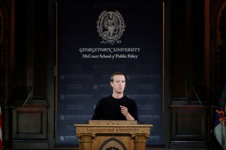 Facebook Chairman and CEO Mark Zuckerberg addresses the audience in Georgetown University's Institute of Politics and Public Service in Washington