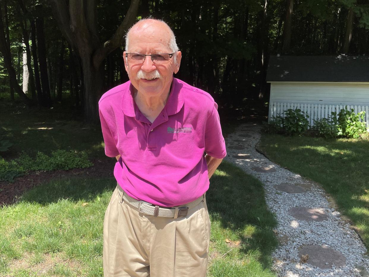 Lloyd Wolters, 92, stands outside his house which borders Laketown Township’s Wolters Woods Park on July 13, 2022. The park which bears his family’s name was dedicated 30 years ago as a way to maintain nature in the fast-growing township