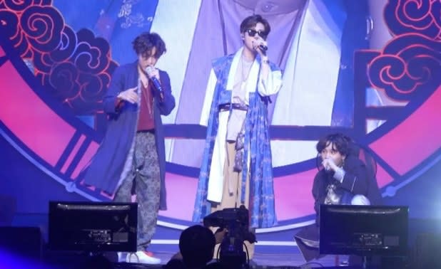 The rap line of BTS wear hanbok and perform on stage