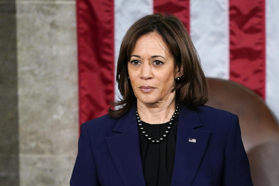 FILE - Vice President Kamala Harris waits for the arrival of Ukrainian President Volodymyr Zelenskyy to address a joint meeting of Congress on Capitol Hill in Washington, Dec. 21, 2022. Local organizers in Washington say three buses of recent migrant families arrived from Texas near the home of the Vice President in record-setting cold on Christmas Eve. Texas authorities have not confirmed their involvement. (AP Photo/Carolyn Kaster, File)