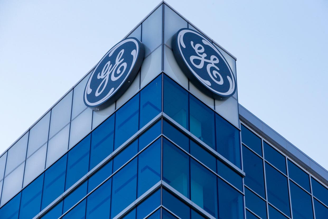 The General Electric logo is displayed at the top of their Global Operations Center, in the Banks development of downtown Cincinnati. (AP Photo/John Minchillo, File)