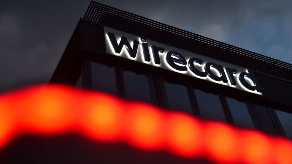 The logo of German payments provider Wirecard is seen at a building of the company's headquarters in Aschheim near Munich, southern Germany, on September 2, 2020