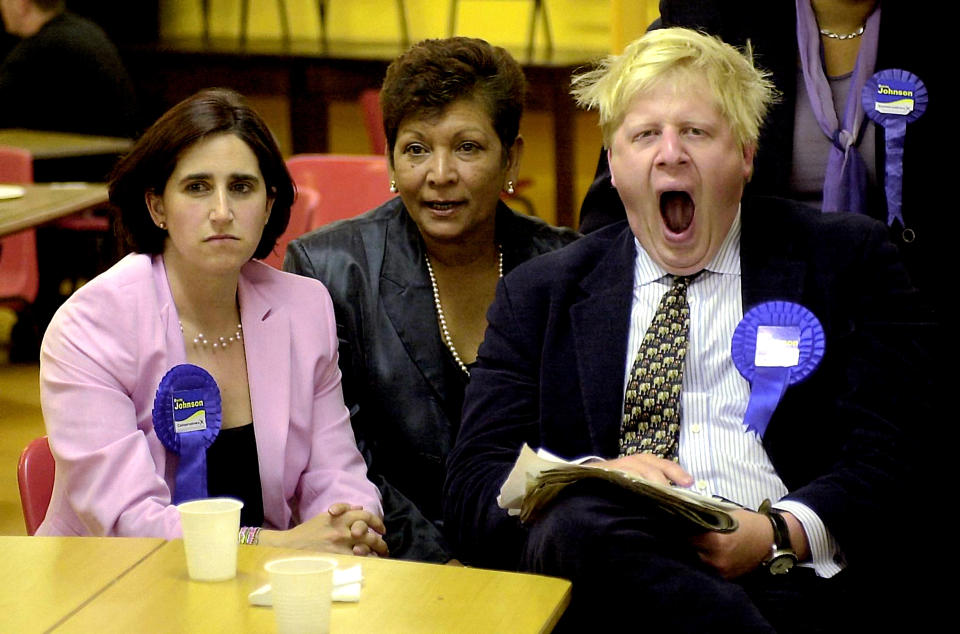 Journalist Boris Johnson yawns while watching the election results in the early hours of the morning with his wife Marina (L), at the count in Watlington, Oxfordshire, after winning the Henley seat for the Conservatives.  * ...in the 2001 General Election. The seat was Michael Heseltine's, who has stepped down at this election.