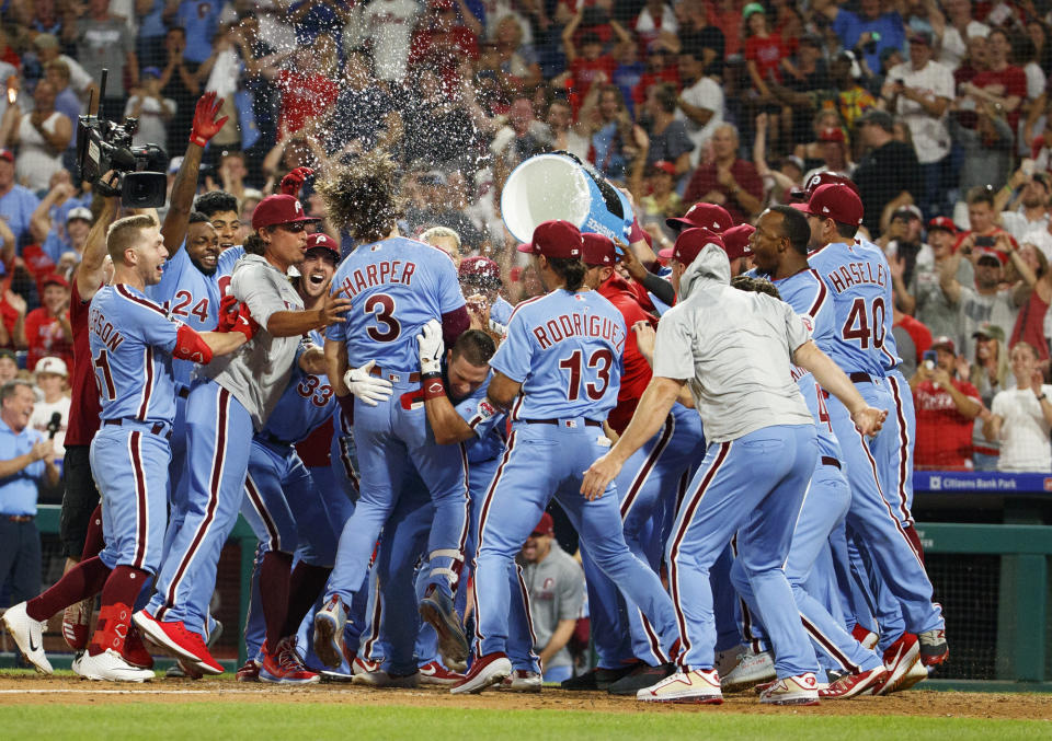 Bryce Harper sinks Cubs with dramatic walk-off grand slam. (AP Photo/Chris Szagola)