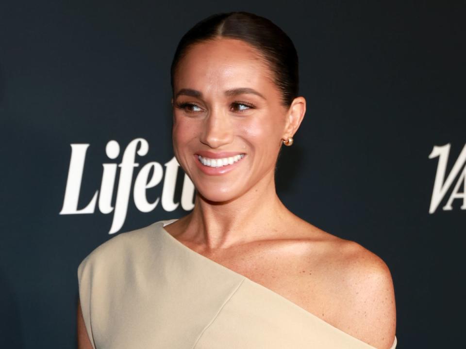 The duchess flashes a trademark smile (Getty Images)