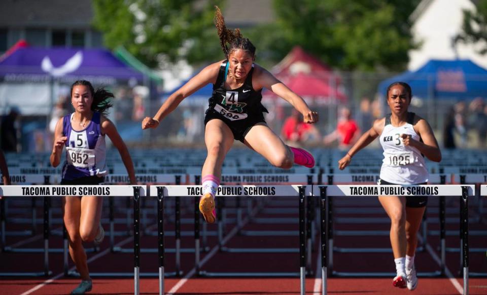 Emerald Ridge’s JaiCieonna Gero-Holt runs to a state title in the 4A girls 100-meter hurdles during the second day of the WIAA state track and field championships at Mount Tahoma High School in Tacoma, Washington, on Friday, May 26, 2023. Just minutes earlier, Gero-Holt won the high jump state title, giving her three state championships in two days.