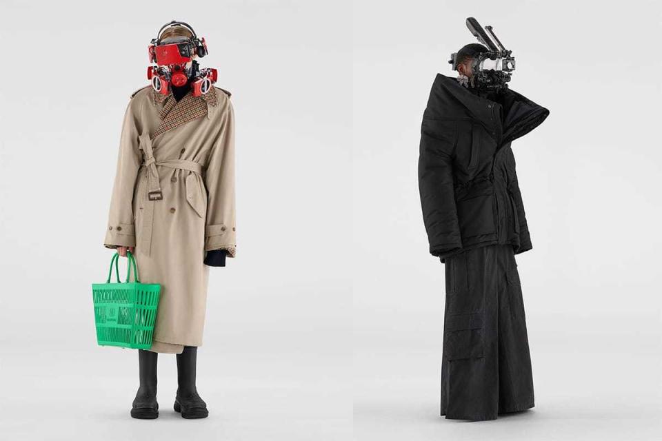 Models sport floor-length trench coats and futuristic robotic masks for Balenciaga's Spring 22 campaign.