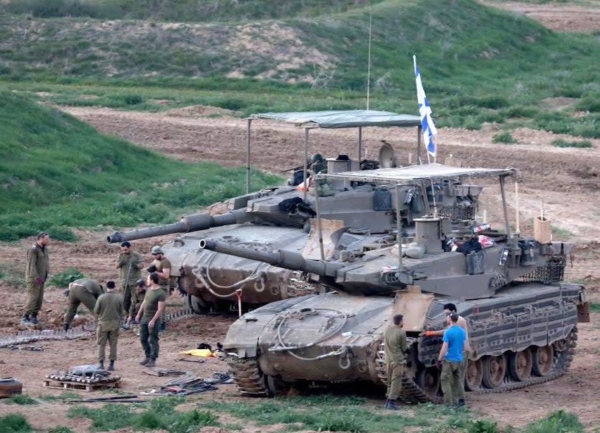 A Merkava Mk 3 seen near Gaza on January 21, 2024, with the extended anti-magnetic stripping, but an older style armor screen on its turret. <em>Gil Cohen Magen/Xinhua</em>
